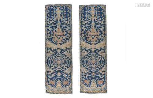 A pair of lined embroidered silk banners, decorated with dra...