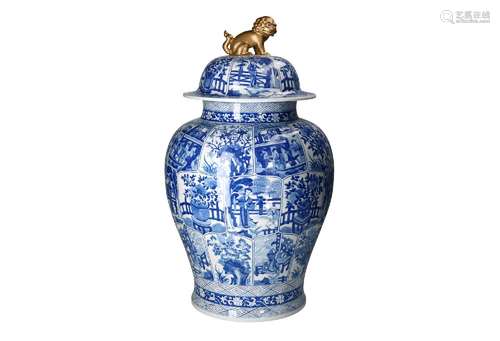 A blue and white porcelain lidded jar on carved wooden base,...