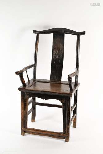 A pair of carved wooden chairs