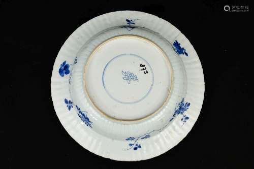 A blue and white porcelain deep charger with lobed rim, deco...