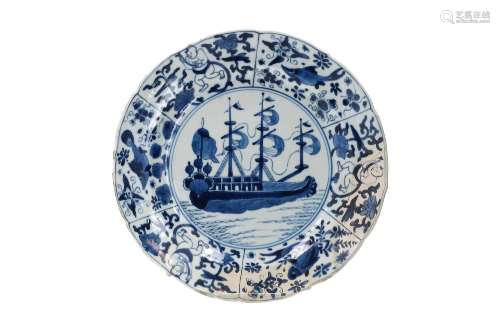 A blue and white porcelain dish with lobed rim, decorated wi...