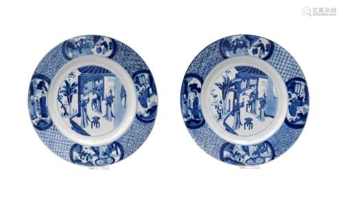 A pair of blue and white porcelain dishes, decorated with sc...