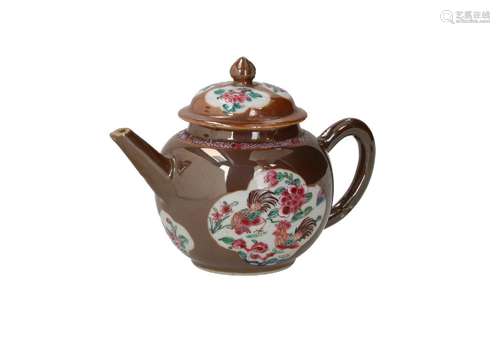 A capucine porcelain teapot, decorated with famille rose res...