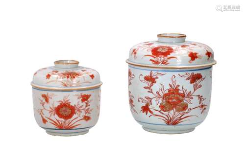 A lot of two iron red and white porcelain lidded jars, decor...