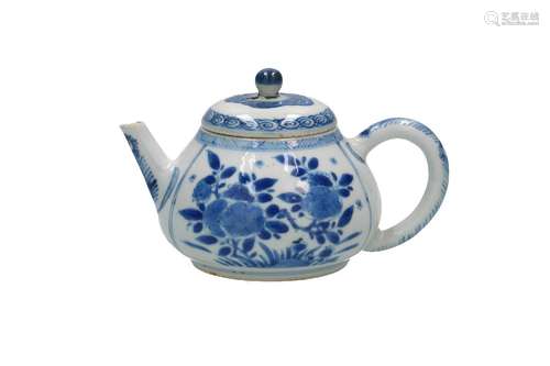 A blue and white porcelain teapot, decorated with flowers