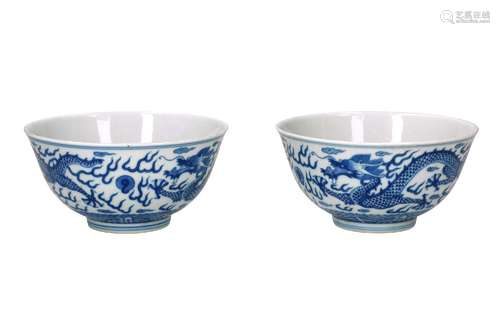 A pair of blue and white porcelain bowl, decorated with two ...