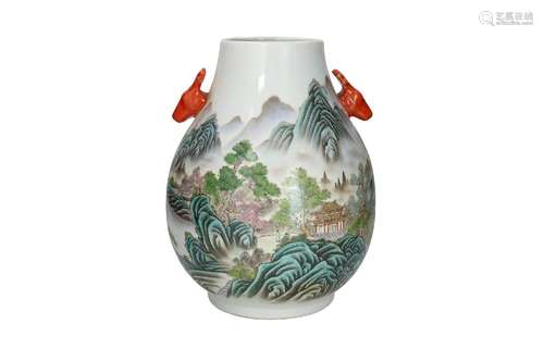 A polychrome porcelain Zun shaped vase with two grips in the...