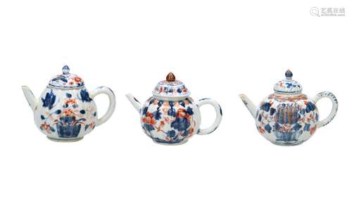 A lot of three Imari porcelain ribbed teapots, decorated wit...