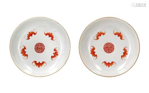 A pair of polychrome porcelain dishes, decorated with flower...