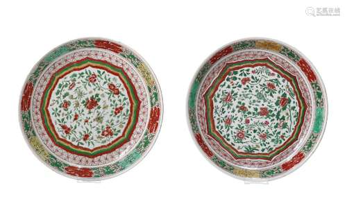 A pair of famille verte porcelain deep chargers, decorated w...