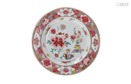 A famille rose porcelain charger, decorated with flowers