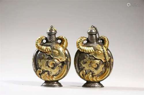 A Pair of Gilt Bronze Ox Bottles