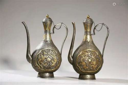 A Pair of Gilt Bronze Dragon and Phoenix Ewers