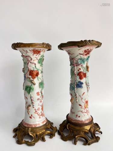 A pair of bronze mounted famille vases, QianLong Pr.