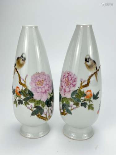 A pair of vases, signed, purchased in 1980's.