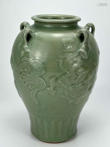 A dragon encaved green ground vase, Ming Dynasty Pr.
