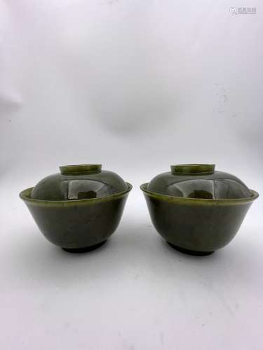 A pair of green jade made covered cups, Qing Dynasty Pr.