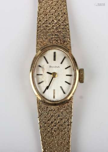 A Bulova 9ct gold lady's bracelet wristwatch, the signed ova...