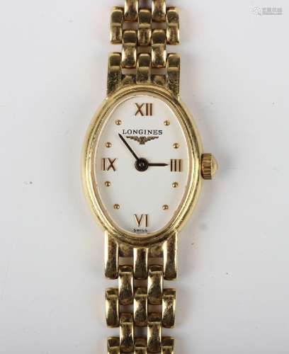 A Longines 18ct gold lady's bracelet wristwatch, the signed ...