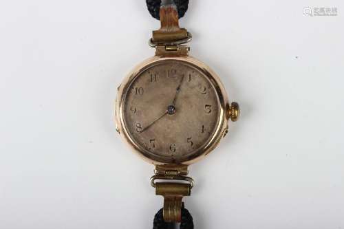 A 9ct gold circular cased lady's wristwatch, the jewelled le...