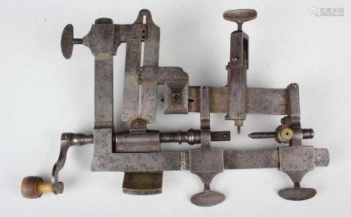 A 19th century steel watchmaker's lathe, length 26cm.