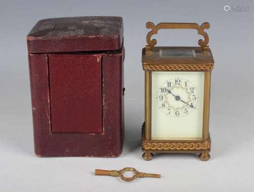 An early 20th century brass cased carriage timepiece with ei...