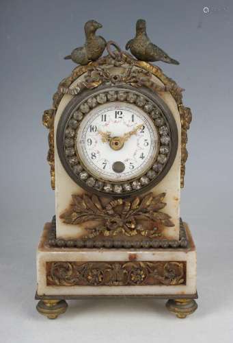 A late 19th century French ormolu mounted marble mantel time...