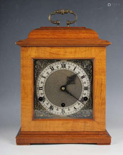 A 20th century walnut cased bracket style mantel clock by Pe...