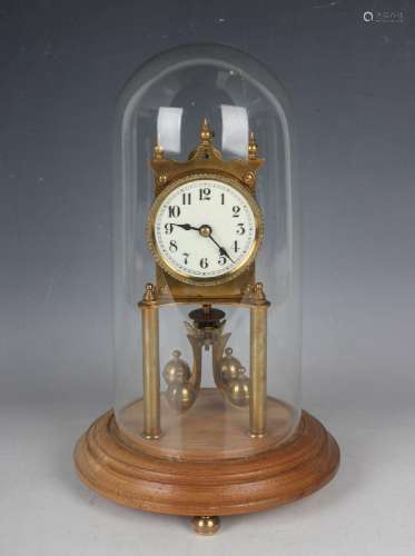 An early 20th century brass anniversary timepiece by Kiening...