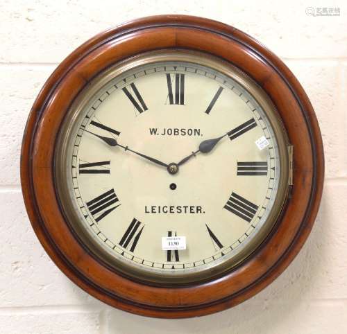 An early 20th century walnut circular cased wall timepiece w...