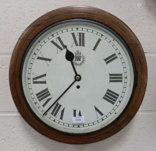 A 20th century beech cased circular wall clock with eight da...