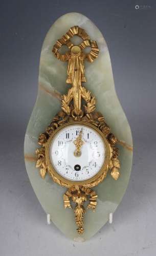 An early 20th century French ormolu and onyx wall timepiece,...