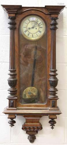 A late 19th century walnut Vienna style wall clock with eigh...