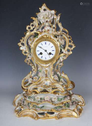 A mid-19th century French Paris porcelain mantel clock and s...