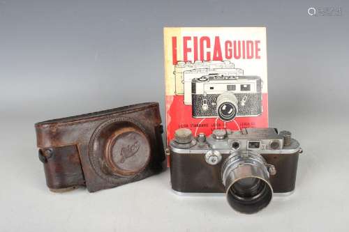 A Leica model IIIa camera, No. 193863, circa 1936, with Leit...