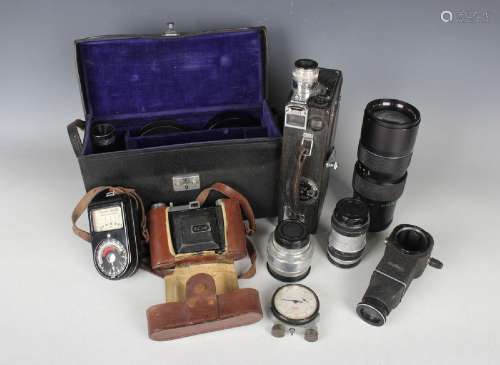A collection of assorted cameras and accessories, including ...