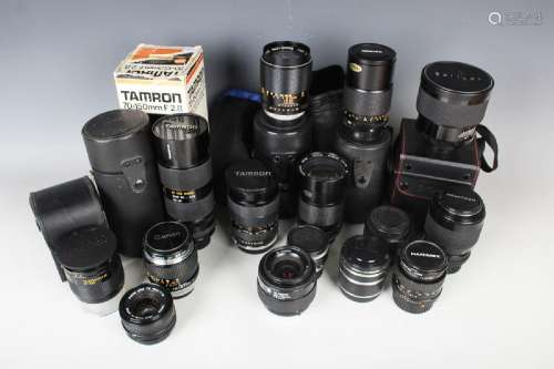 A collection of assorted camera lenses, including Apo-Sigma ...