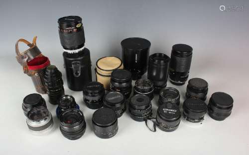 A collection of assorted camera lenses, including Tamron SP ...