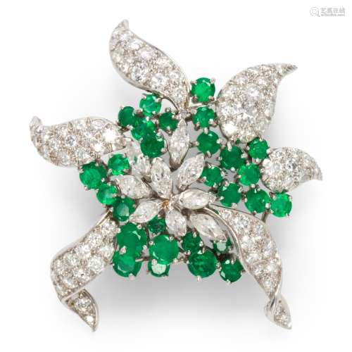 A diamond, emerald and platinum brooch