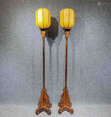 A PAIR OF CHINESE HUANGHUA ROSEWOOD PALACE LAMPS, QING DYNAS...
