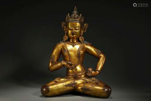 Bronze gilded Buddha statue