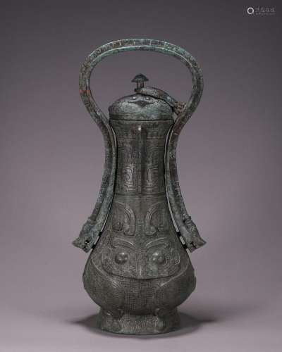 CHINESE ANCIENT BRONZE LONG HANDLED LIDDED BEAST FACE KETTLE