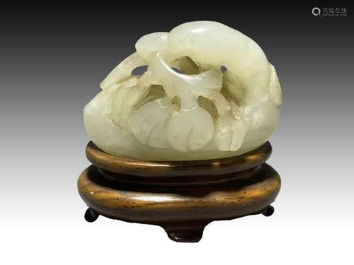 A CHINESE WHITE RUSSET JADE CRANE, QIANLONG PERIOD (1736-179...