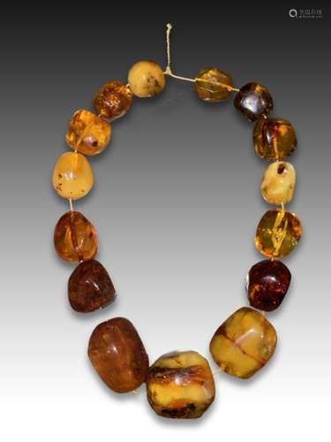 LARGE CHINESE AMBER BEADS