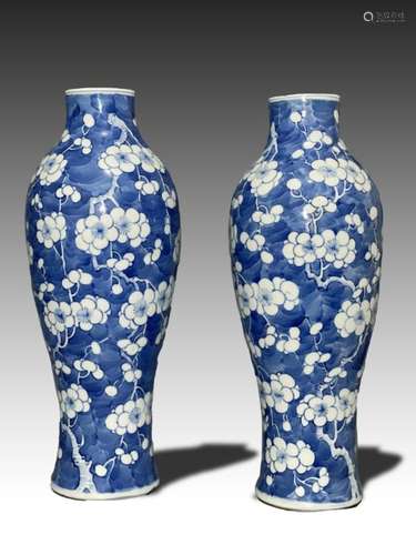 A PAIR OF BLUE & WHITE CHINESE PRUNUS VASES EACH BEARING...