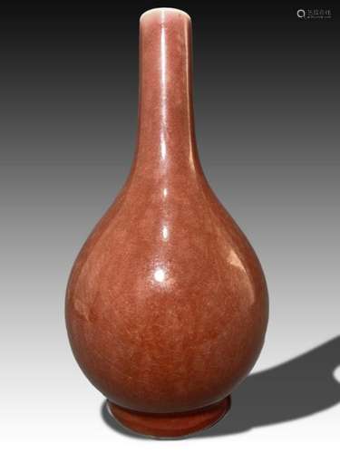 A CHINESE RED MONOCHROME BOTTLE VASE, QING DYNASTY (1644-191...