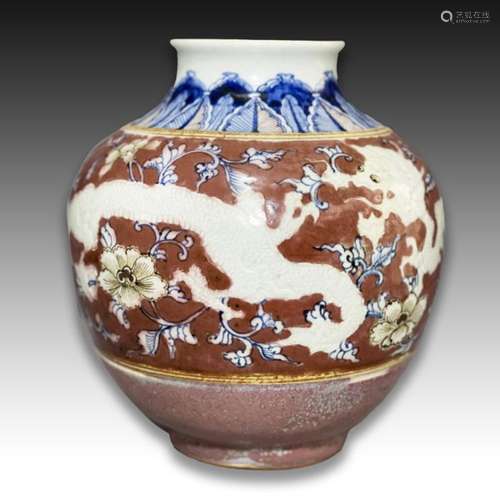 A CHINESE DRAGON JAR PAINTED IN UNDERGLAZED COPPER RED, LATE...