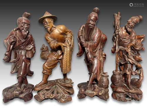 FOUR CHINESE HARDWOOD CARVED FIGURES, QING DYNASTY (1644-191...