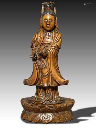 A CHINESE BOXWOOD FIGURE OF A GUANYIN, QING DYNASTY (1644-19...