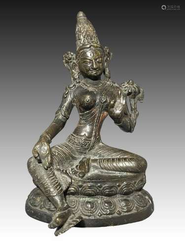 A CHINESE TIBETAN SEATED BRONZE BUDDHA